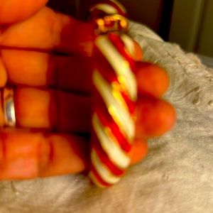 Hinged gold tone bracelet red and white candy striped
